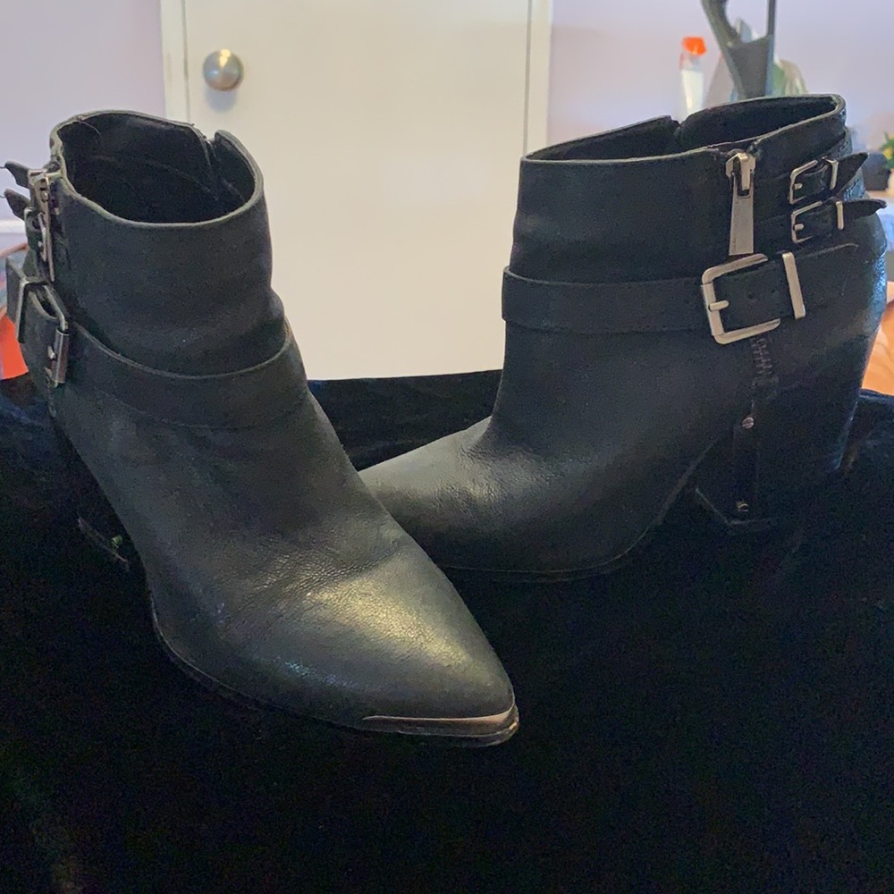 Vince Camuto ankle high booties.